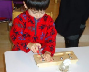 young learners participating in Montessori sensory exercises