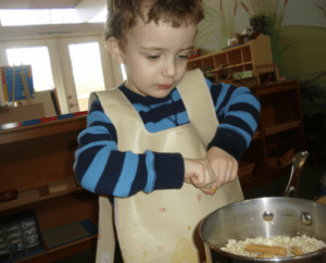 children engaging in hands-on learning with Montessori materials