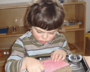 students exploring Montessori language development activities